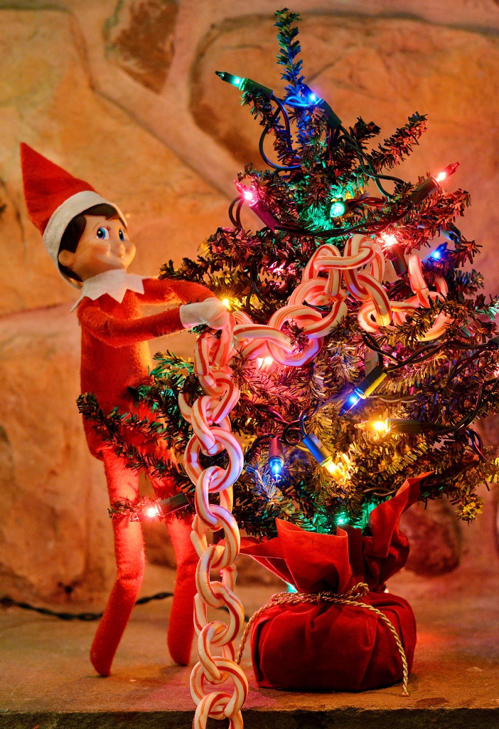 Elf on the Shelf Decorating a Christmas Tree