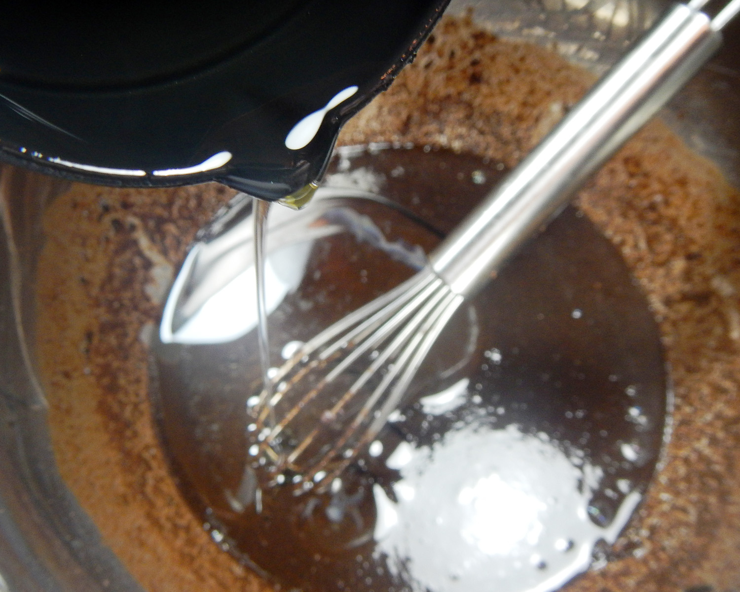 Adding Oil to Cherry Almond Brownie Batter