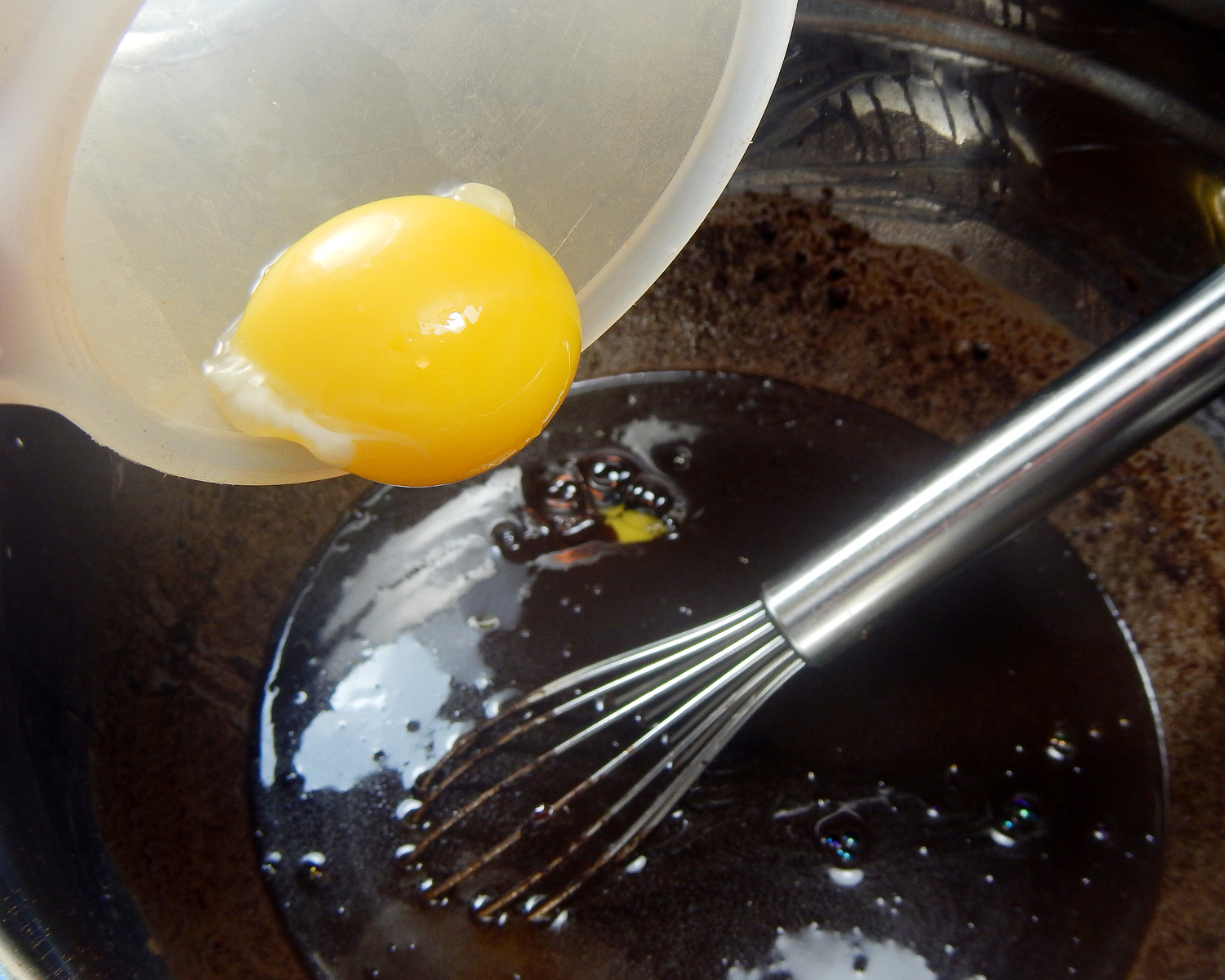Pouring Egg into Brownie Batter