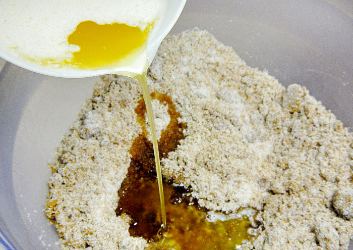 Pouring Melted Butter on Sugar
