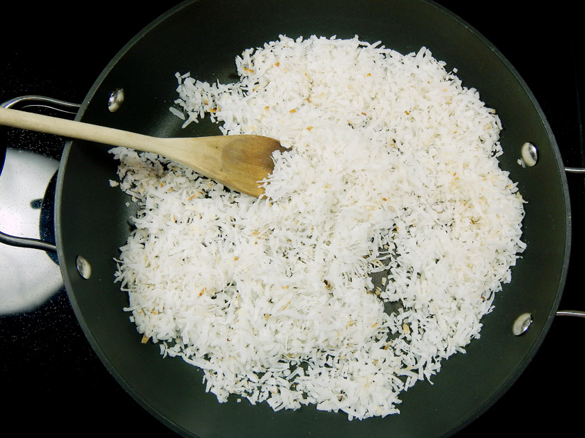 Toasting coconut in a pan
