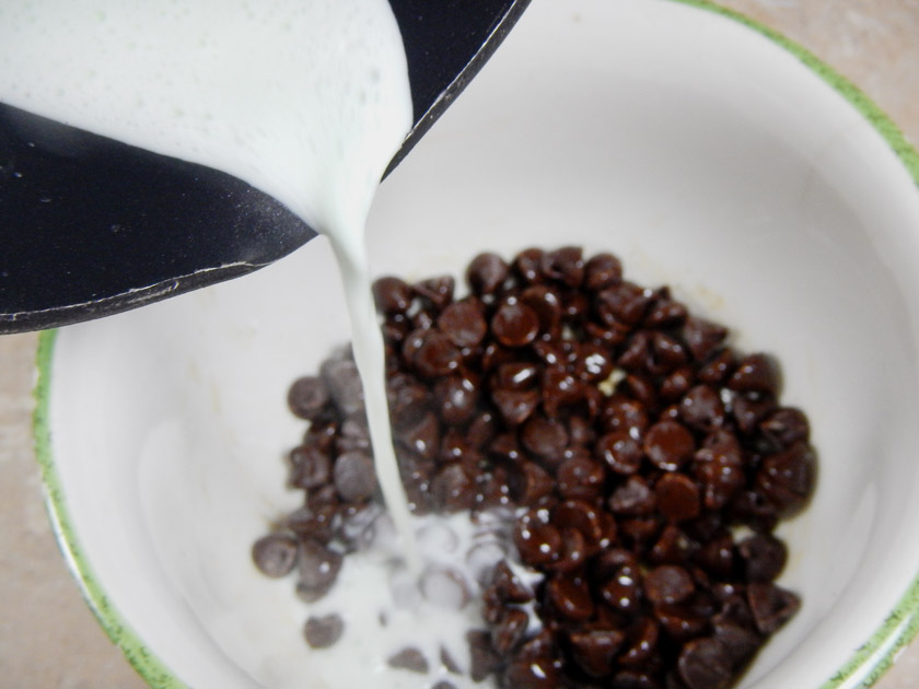 Pouring Heavy Cream over chocolate chips