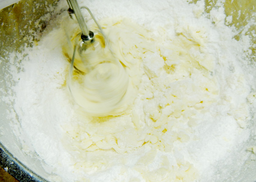 Beating powdered sugar into butter