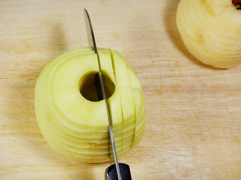 Cutting a peeled apple