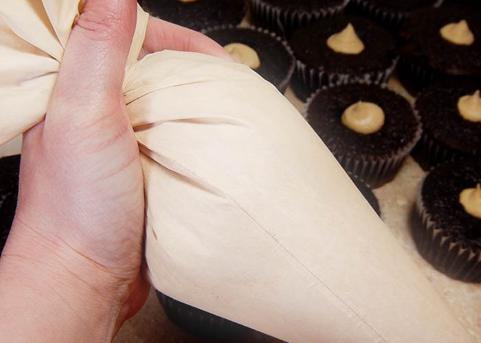 Hand Twisting a Pastry Bag
