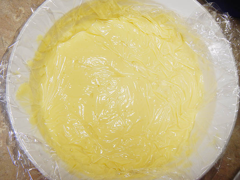 Press plastic wrap on top of pastry cream